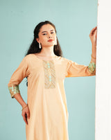 Peach embroidered kurta with neckline placket and 3/4 floral-cuff sleeves