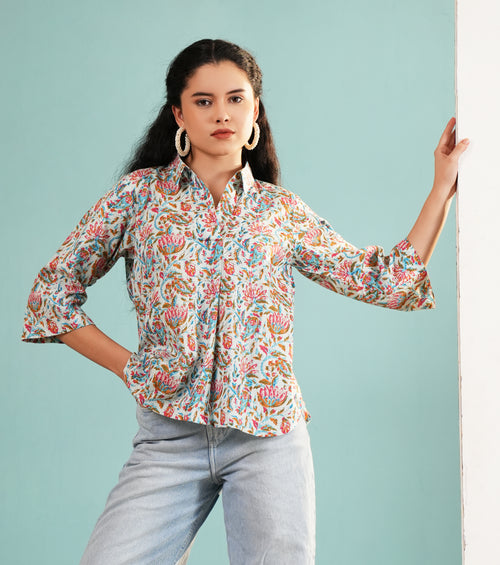 Floral collared tunic with colorful print, button front, elbow-length sleeves