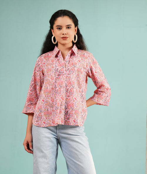 Blush floral collared tunic shirt with button placket and flared three-quarter sleeves